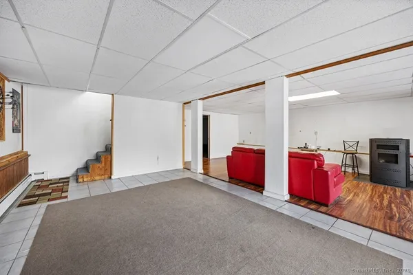 a view of an empty room with furniture