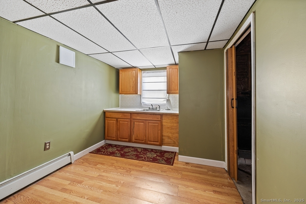 124 East Street Wolcott, CT 06716 - Photo 25 of 39 a view of a room with wooden floor