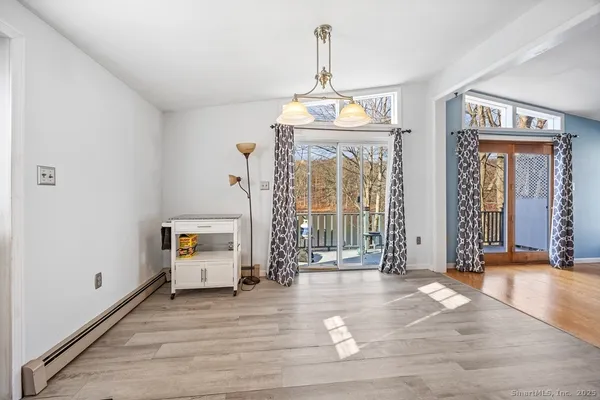 a view of hall with wooden floor