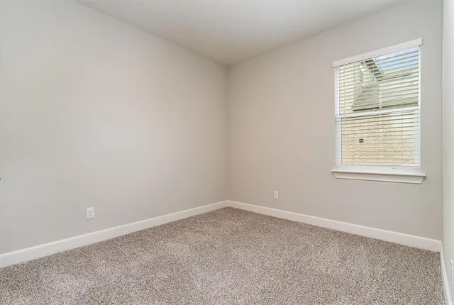 a view of a swimming pool with an outdoor space and seating area