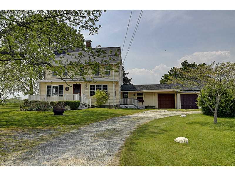 25 Serpentine Road Warren, RI 02885 - Photo 1 of 25 Exterior Front. Farmhouse with garage.
