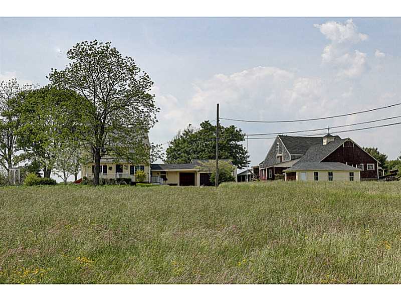 25 Serpentine Road Warren, RI 02885 - Photo 2 of 25 Exterior Front. Farmhouse, garages, cow barn and out buildings.