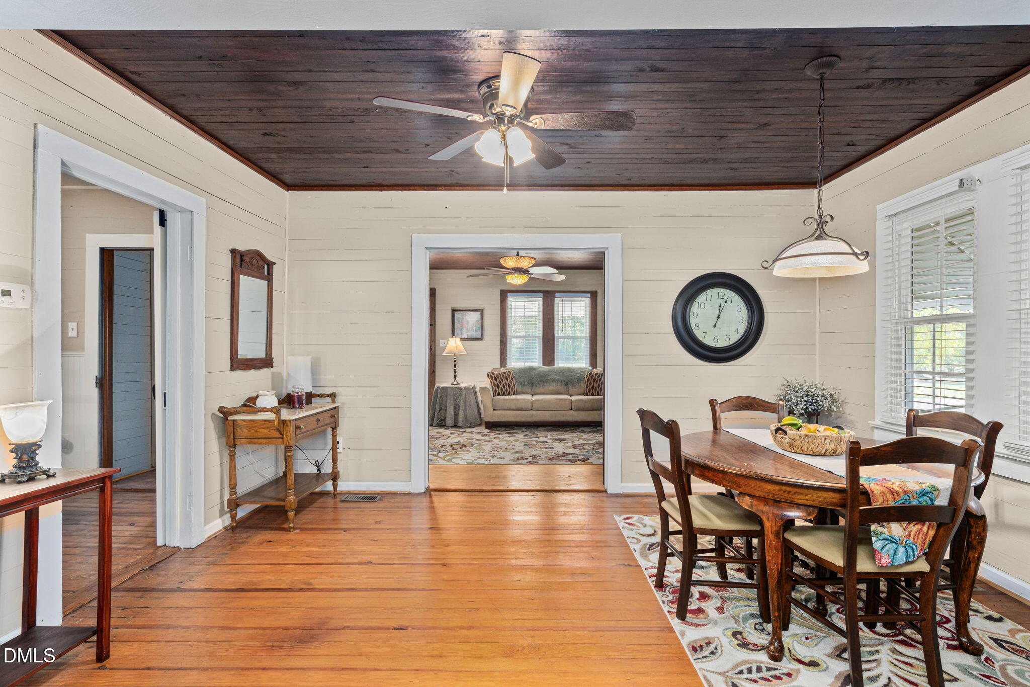 125 Branch Chapel Church Road Selma, NC 27576 - Photo 12 of 39 a view of a dining room with furniture and chandelier