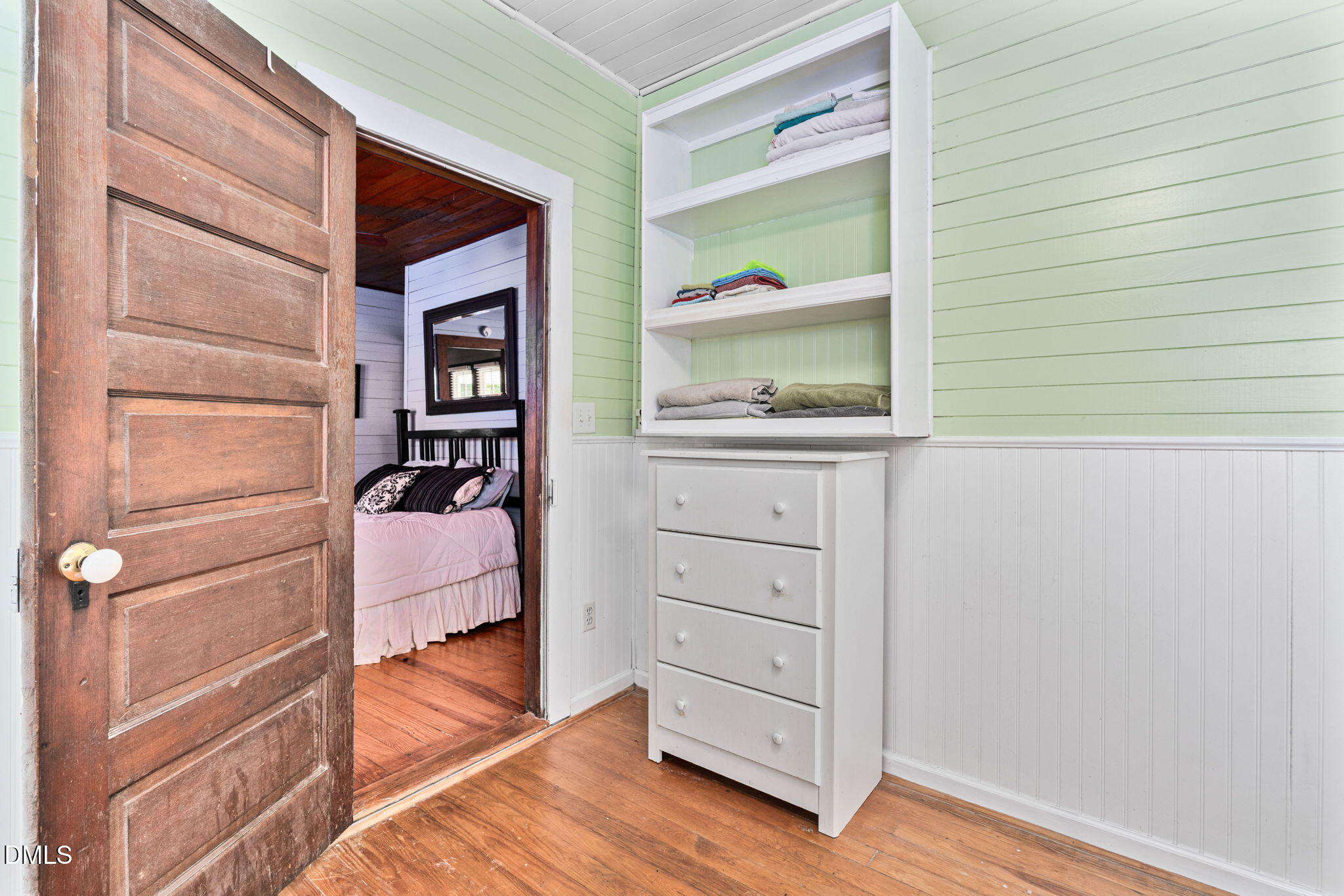 125 Branch Chapel Church Road Selma, NC 27576 - Photo 19 of 39 a room with a baby crib and dresser