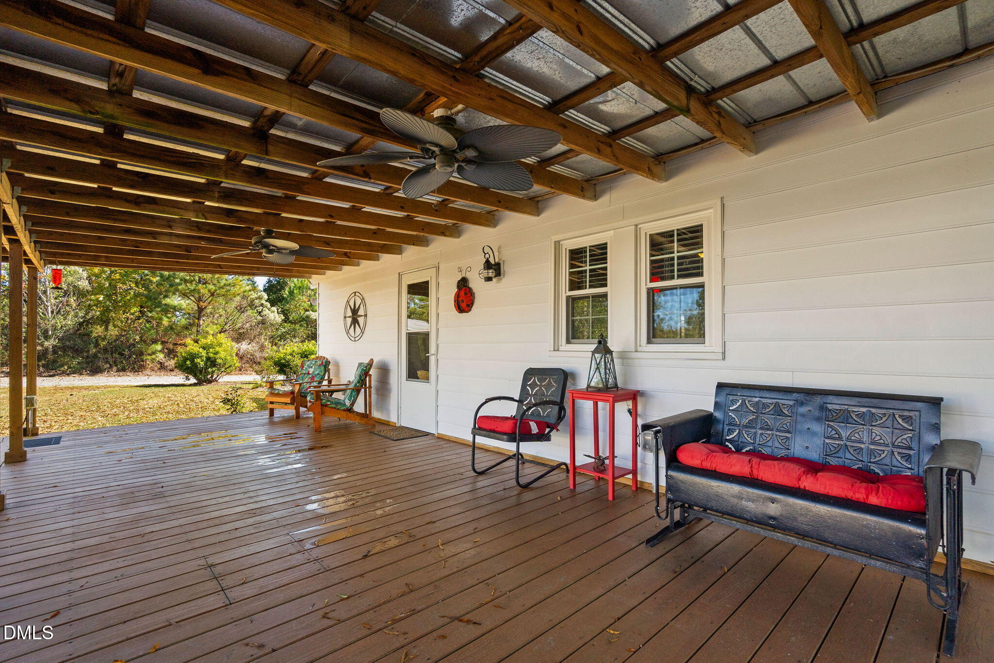 125 Branch Chapel Church Road Selma, NC 27576 - Photo 26 of 39 a living room with furniture and a wooden floor