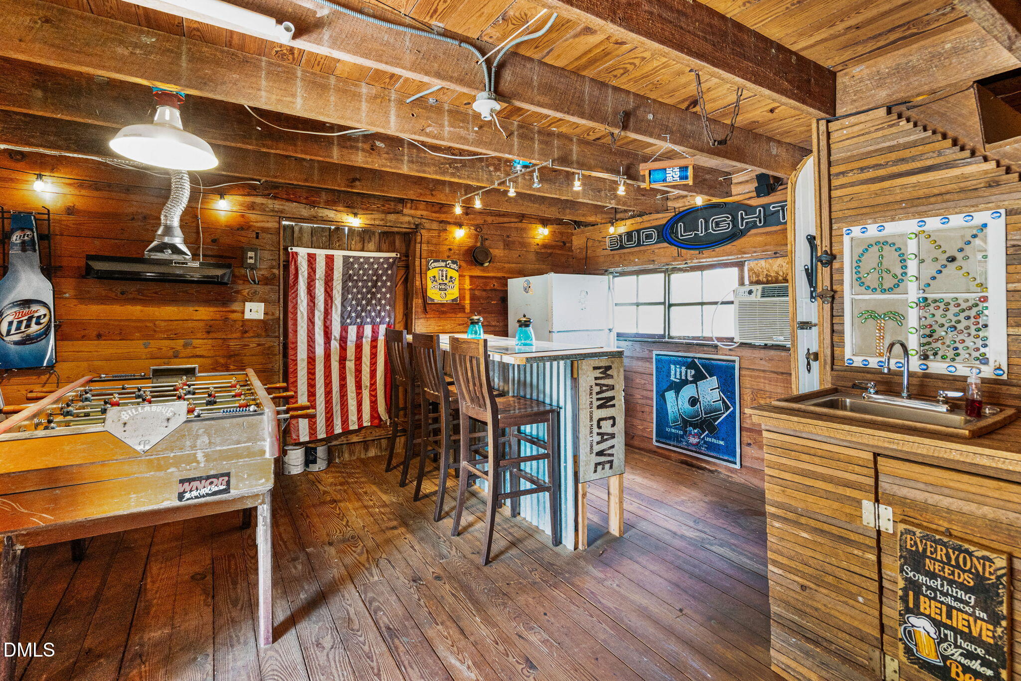 125 Branch Chapel Church Road Selma, NC 27576 - Photo 30 of 39 a view of a patio with table and chairs