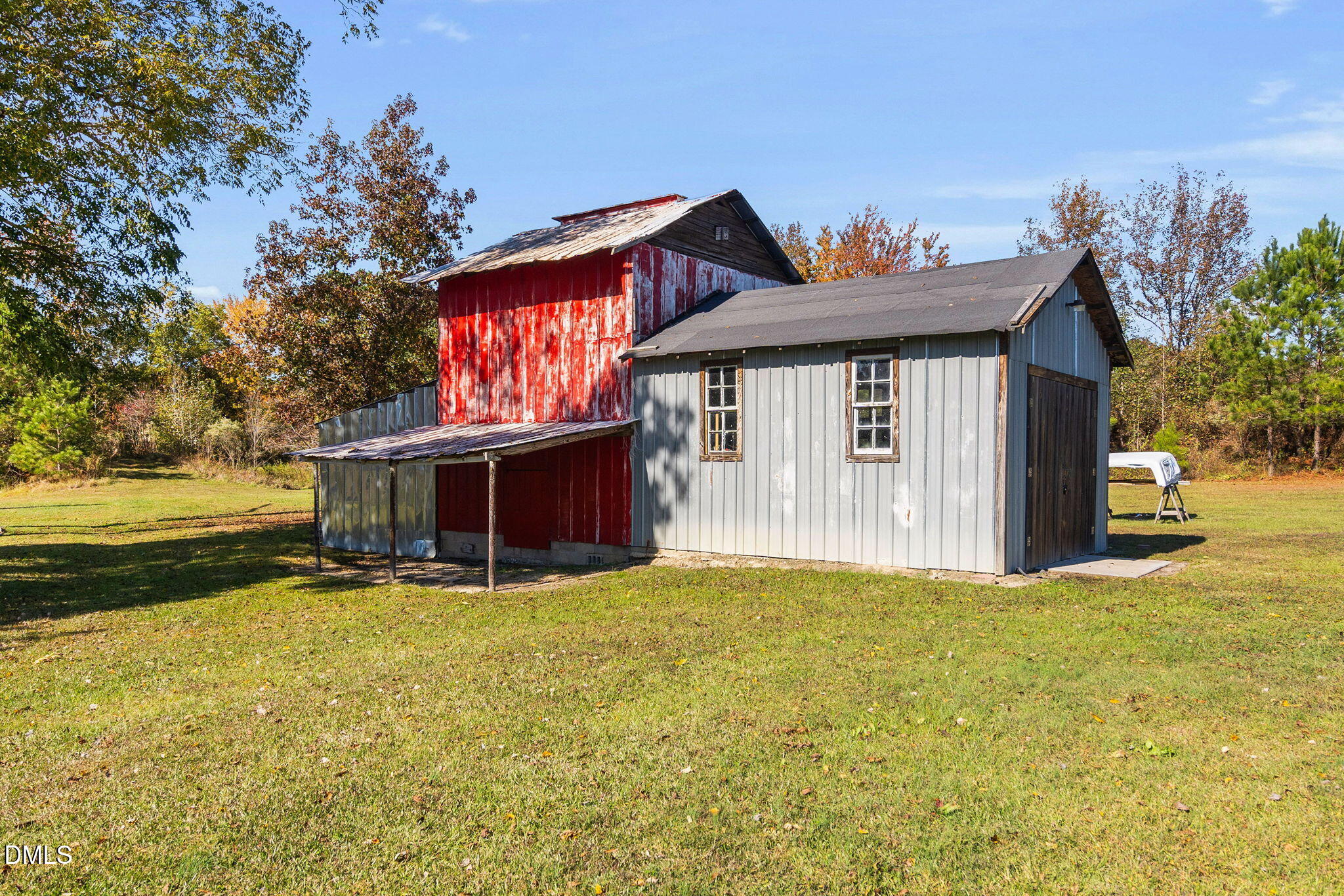 125 Branch Chapel Church Road Selma, NC 27576 - Photo 34 of 39 a view of a house with backyard porch and sitting area