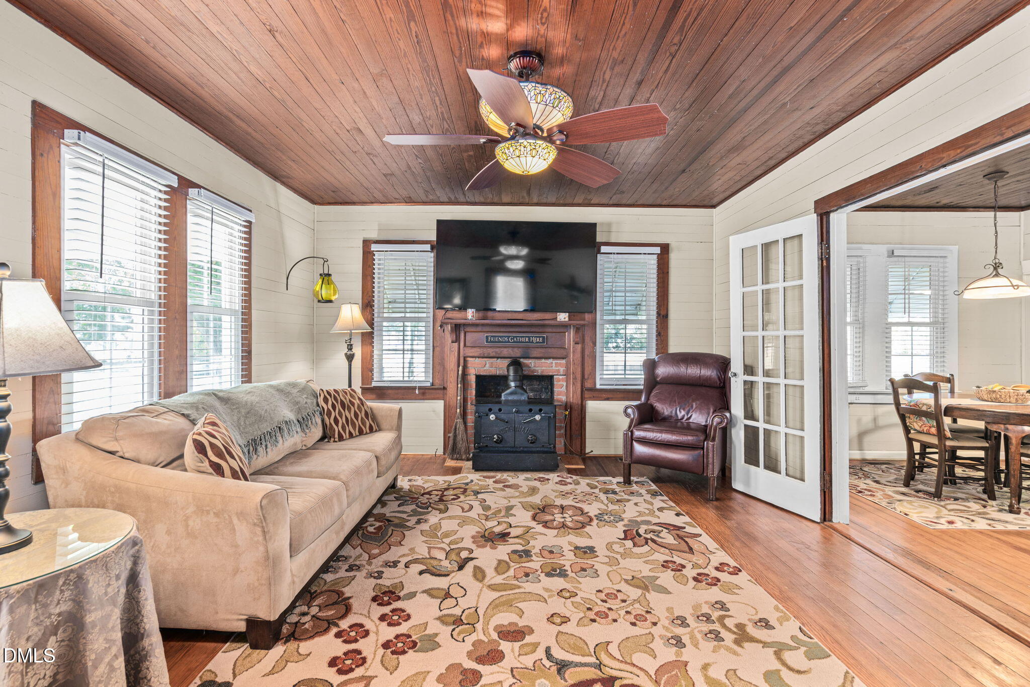 125 Branch Chapel Church Road Selma, NC 27576 - Photo 5 of 39 a living room with furniture fireplace and flat screen tv