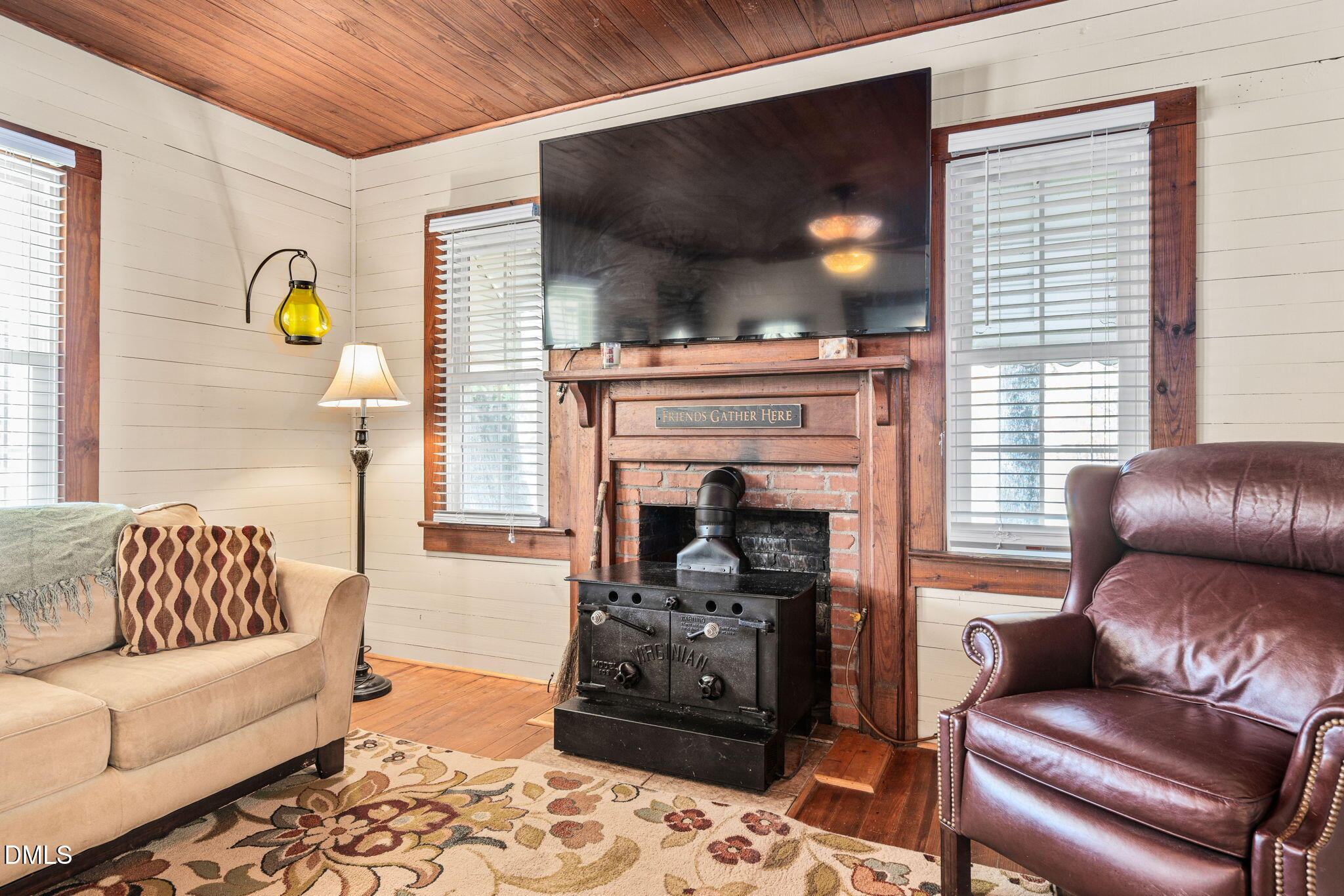 125 Branch Chapel Church Road Selma, NC 27576 - Photo 7 of 39 a living room with furniture and a fireplace