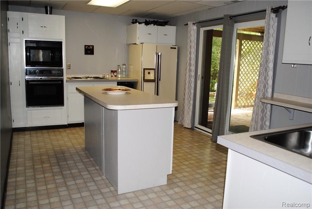 397 Hawk High Hill Road Metamora, MI 48455 - Photo 23 of 30 Lower Level Kitchen