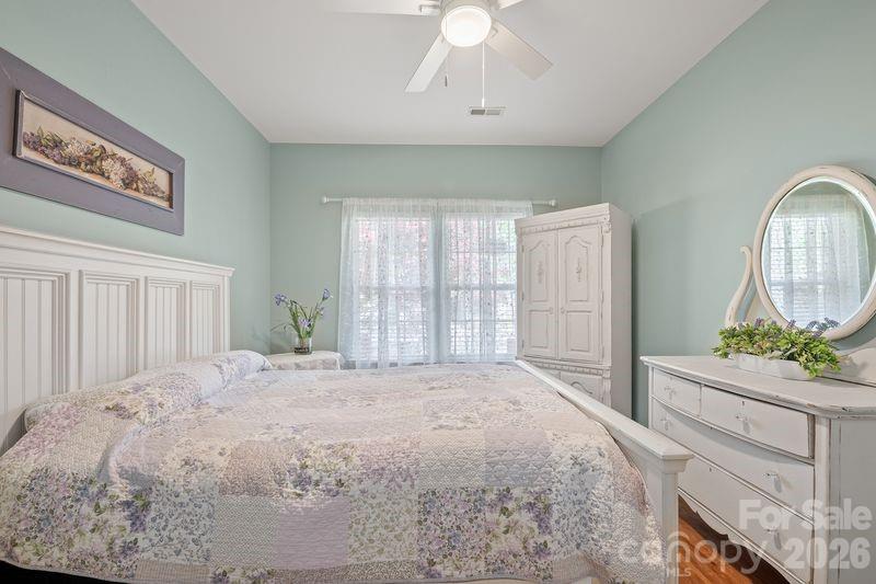16515 Amberside Road East Cornelius, NC 28031 - Photo 23 of 35 a large bed sitting in a bedroom next to a window