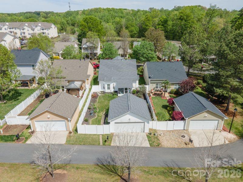 16515 Amberside Road East Cornelius, NC 28031 - Photo 8 of 35 an aerial view of residential houses with outdoor space and parking