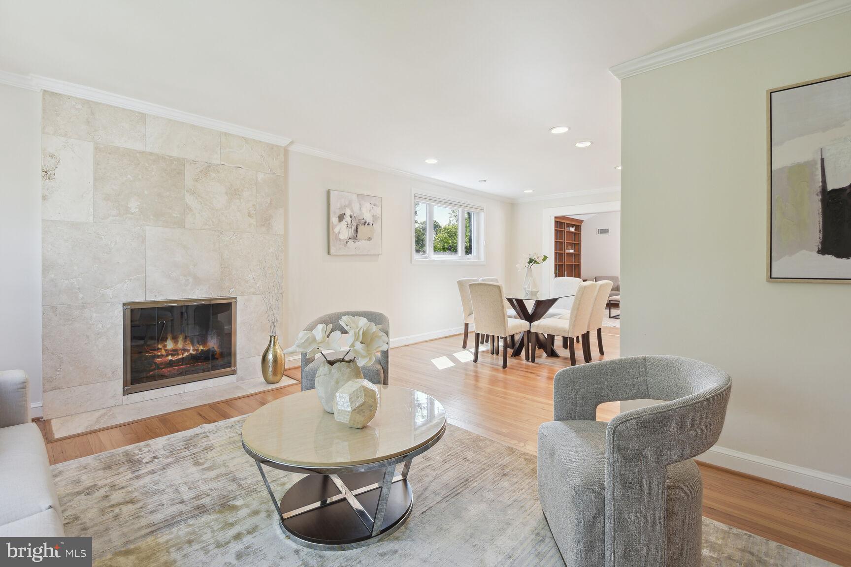 2814 Spencer Road Chevy Chase, MD 20815 - Photo 5 of 35 Fireplace with travertine surround
