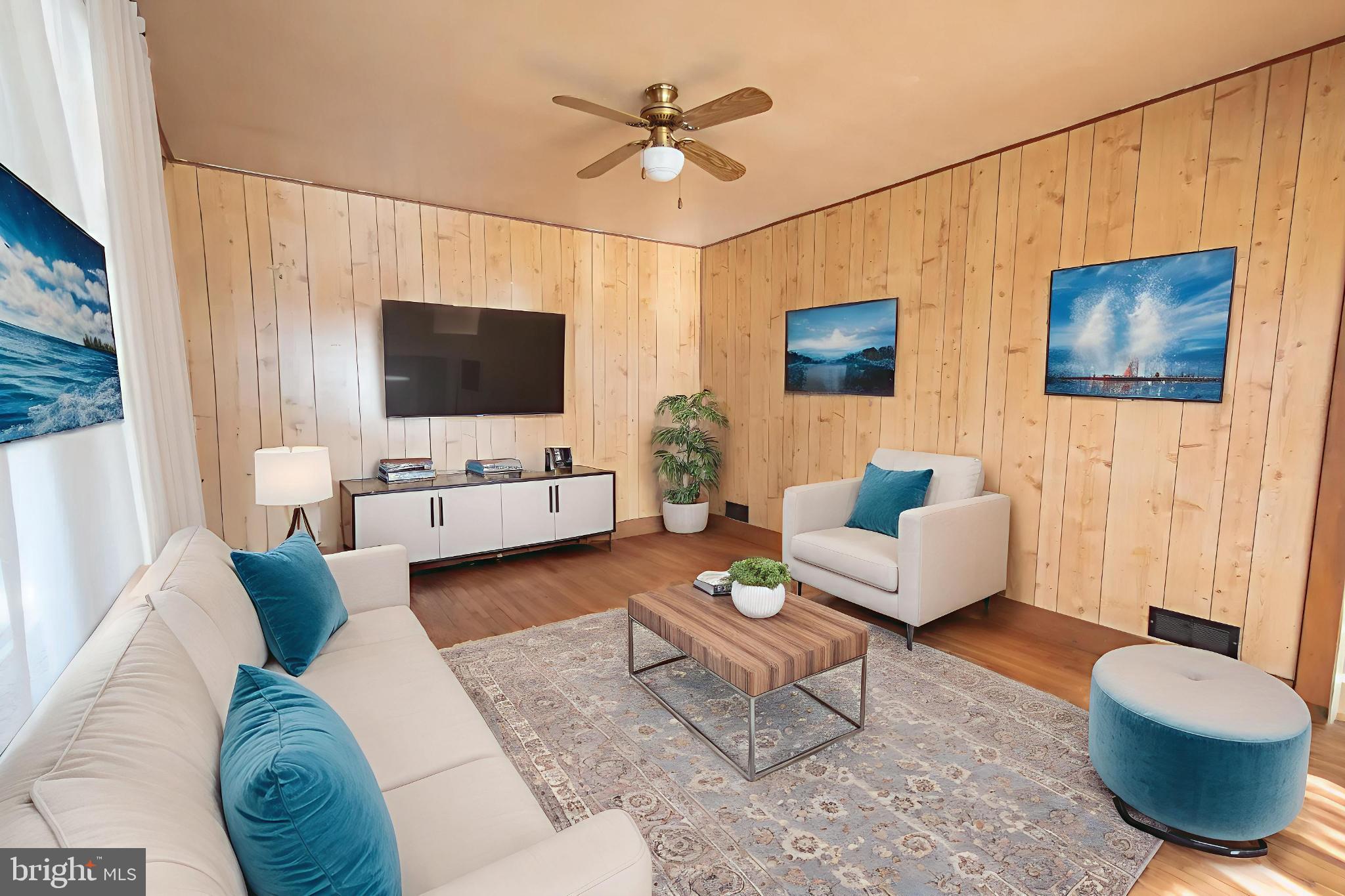 4022 West 7th Street Trainer, PA 19061 - Photo 11 of 49 a living room with furniture and a flat screen tv