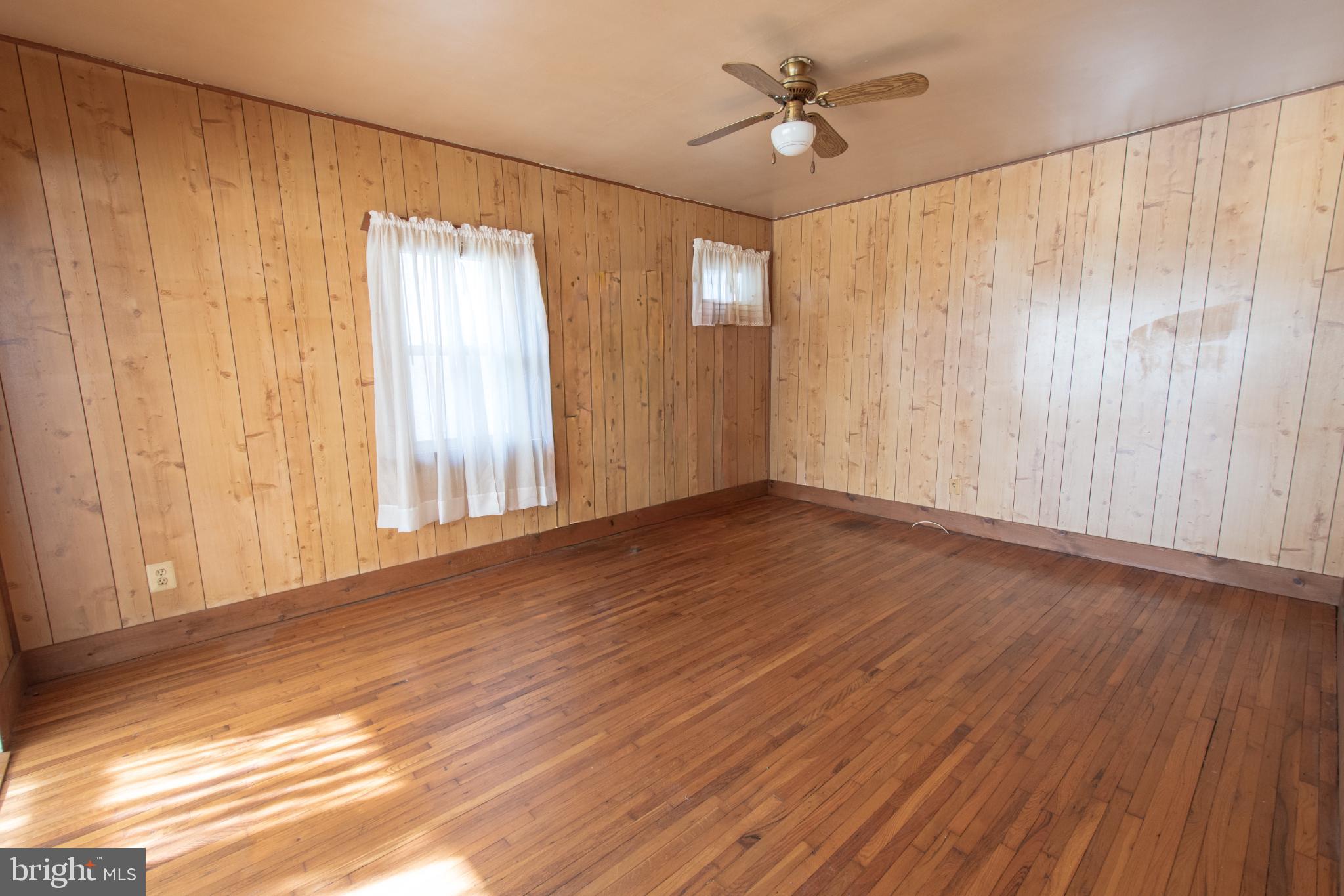 4022 West 7th Street Trainer, PA 19061 - Photo 12 of 49 wooden floor in an empty room with a window