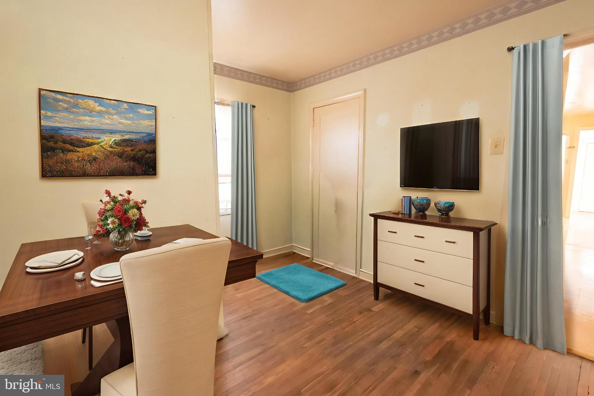4022 West 7th Street Trainer, PA 19061 - Photo 21 of 49 a living room with furniture and flat screen tv