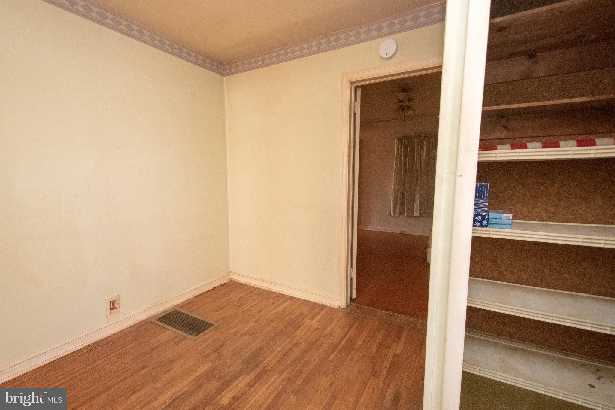 4022 West 7th Street Trainer, PA 19061 - Photo 23 of 49 a view of walk in closet with wooden floor