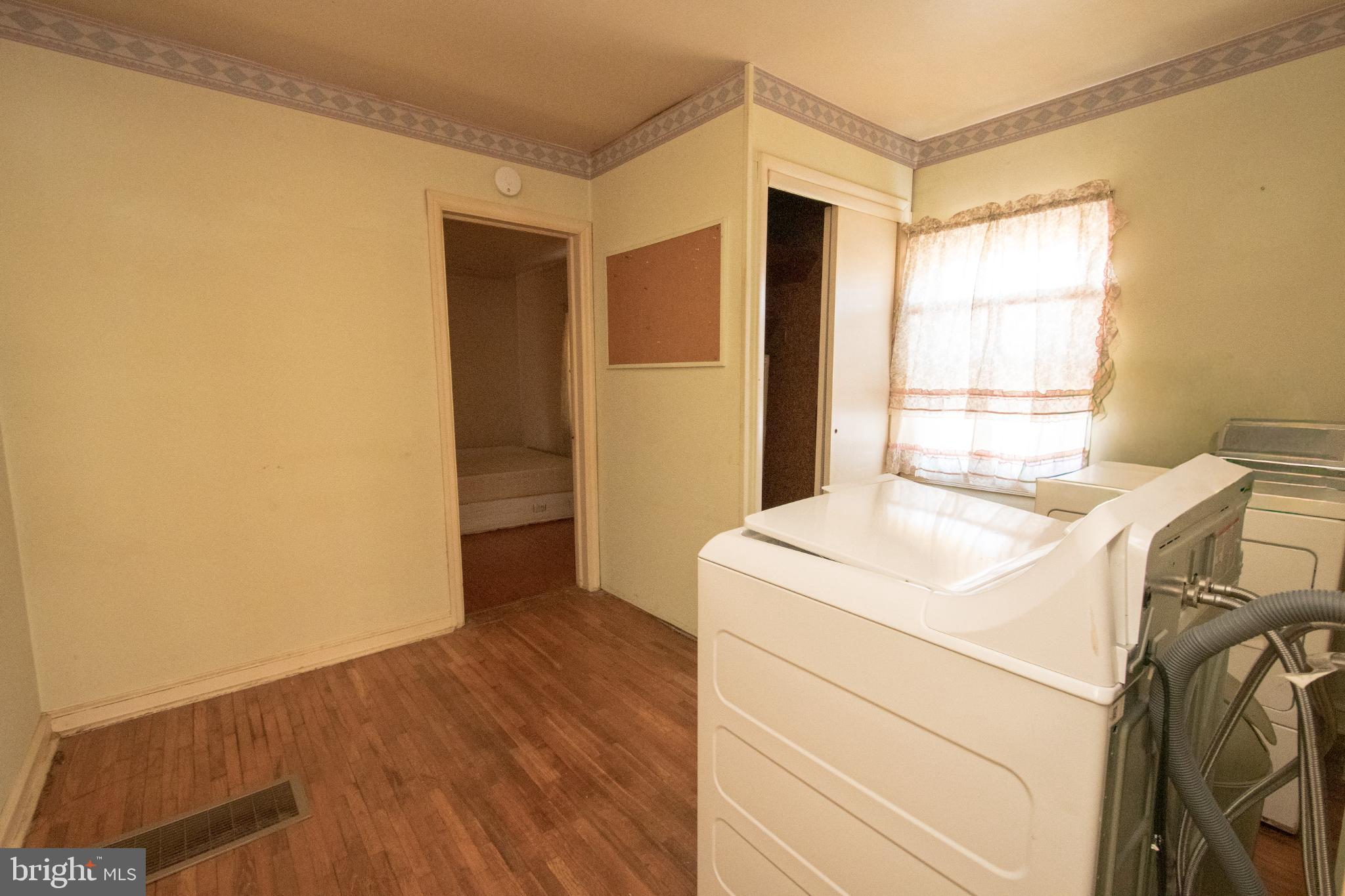 4022 West 7th Street Trainer, PA 19061 - Photo 24 of 49 a utility room with dryer and washer