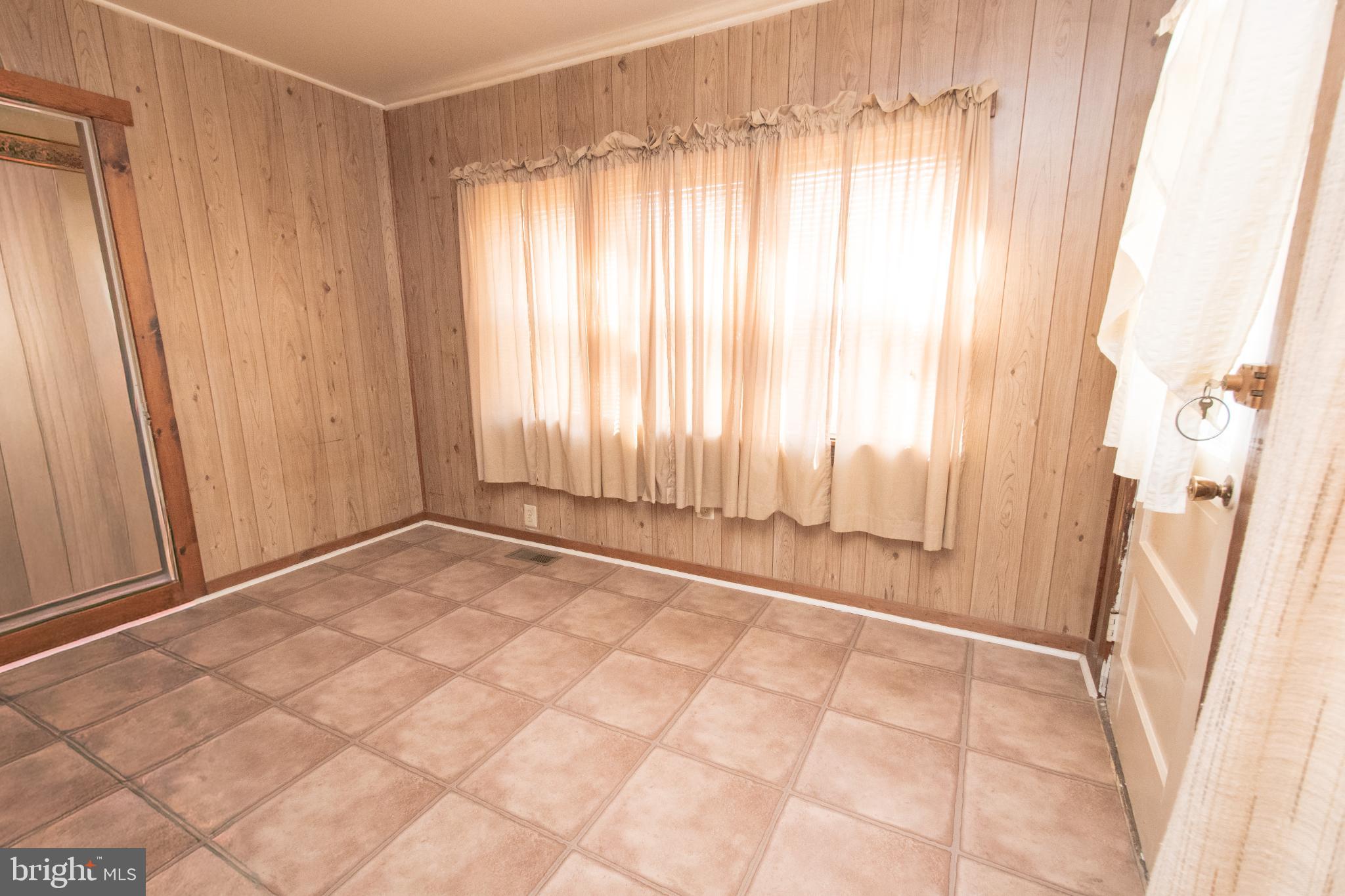4022 West 7th Street Trainer, PA 19061 - Photo 32 of 49 a view of a bathroom with a shower curtain