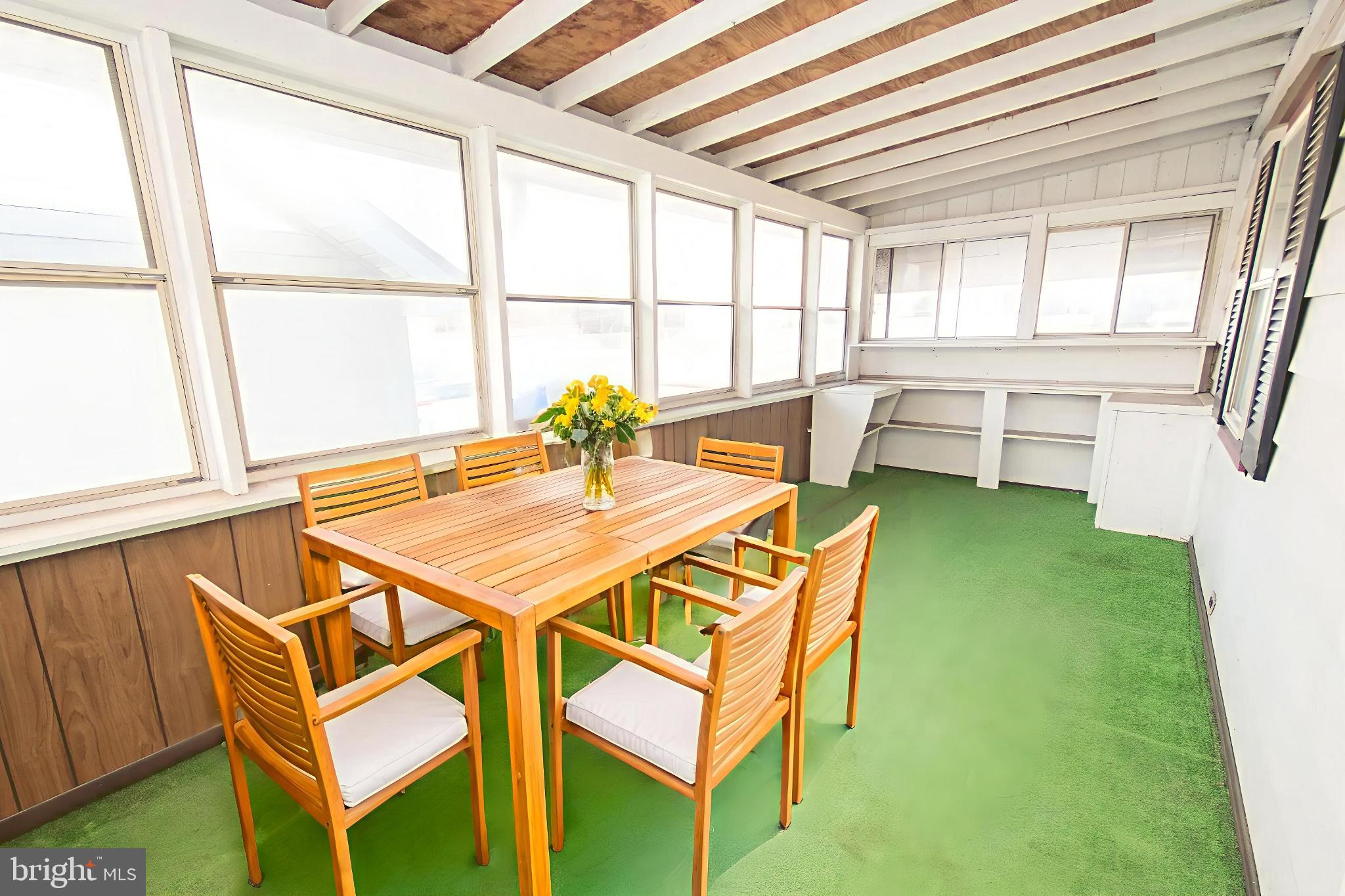 4022 West 7th Street Trainer, PA 19061 - Photo 42 of 49 a patio with a table and chairs