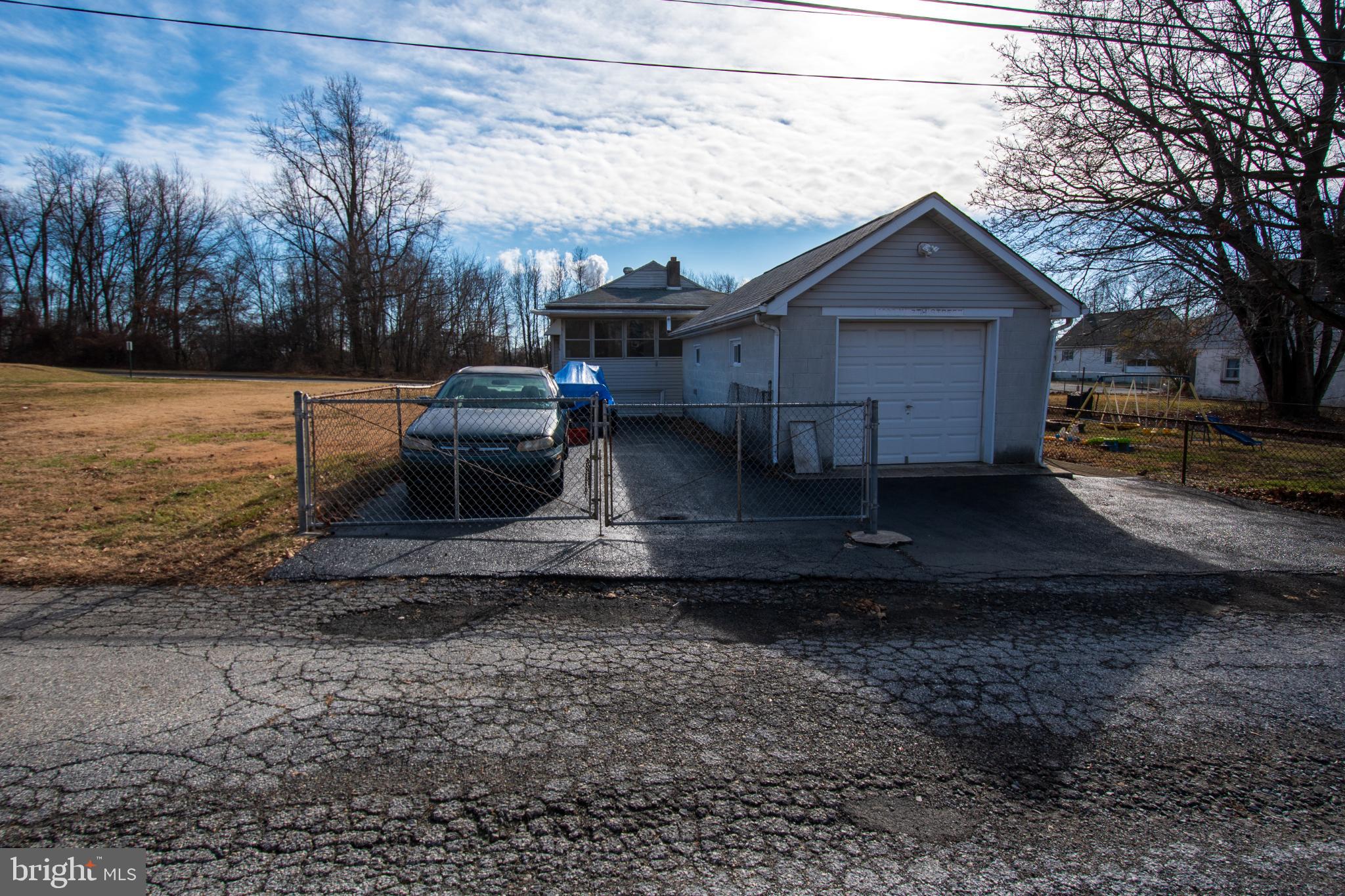 4022 West 7th Street Trainer, PA 19061 - Photo 47 of 49 a view of a house with a yard