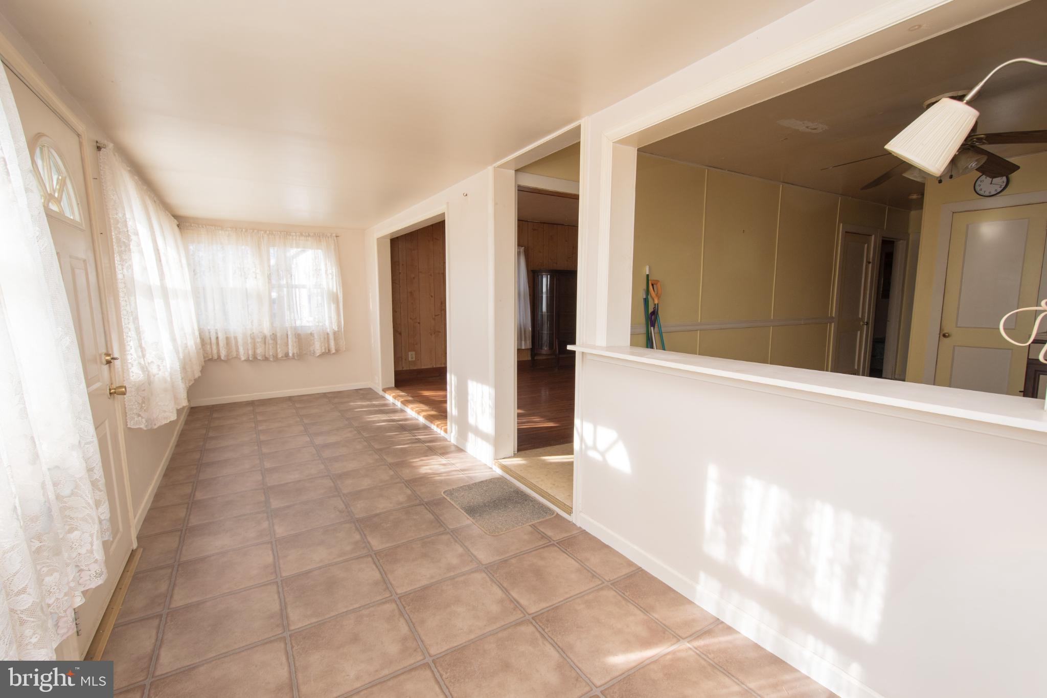 4022 West 7th Street Trainer, PA 19061 - Photo 6 of 49 a view of a hallway with windows