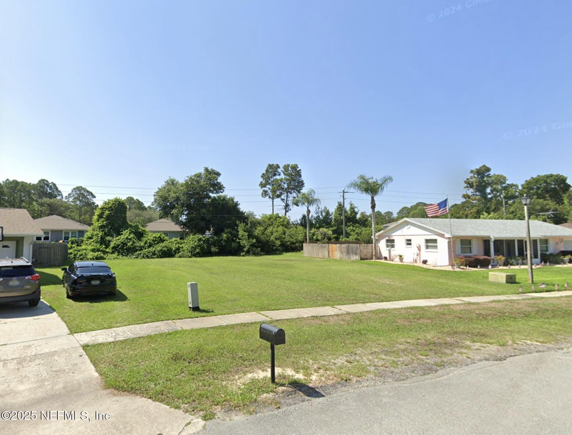837 Rita Circle St. Augustine, FL 32086 - Photo 3 of 4 a front view of a house with garden