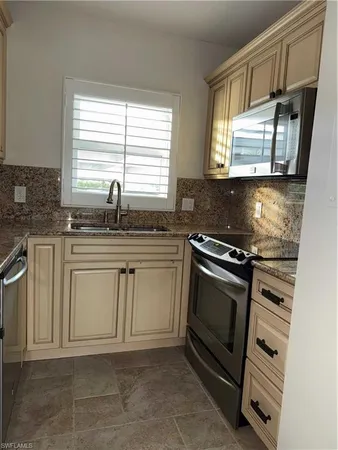 $595,000 | 408 Broad Avenue South, Unit H408, Naples, FL 34102