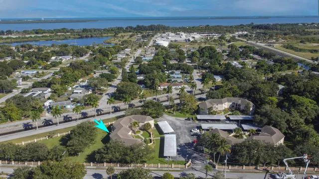 an aerial view of house with yard