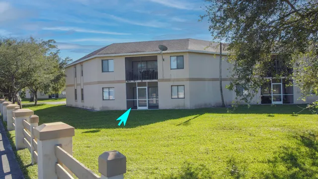 a view of a back yard of the house