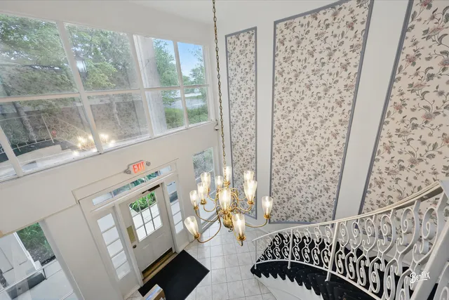 a view of a balcony with wooden floor