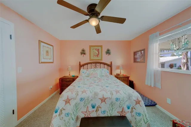 a bathroom with a sink toilet vanity and shower