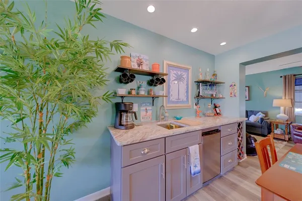 a large kitchen with stainless steel appliances granite countertop lots of counter top space