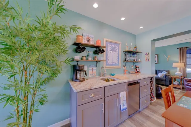 a large kitchen with stainless steel appliances granite countertop lots of counter top space