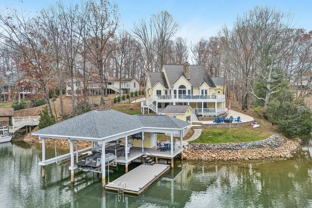 a front view of a house with a boat