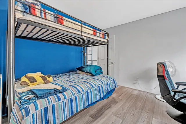 a view of balcony with couch and wooden floor