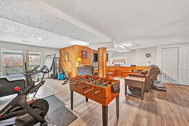 a view of roof deck with patio