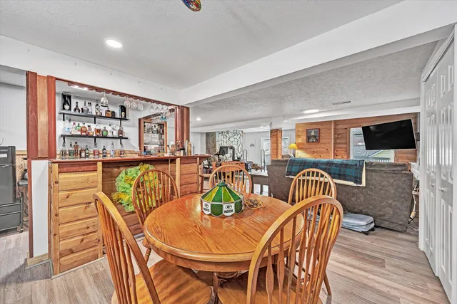 a front view of a house with a lake view