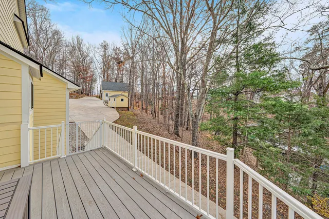 a view of a swimming pool with a backyard