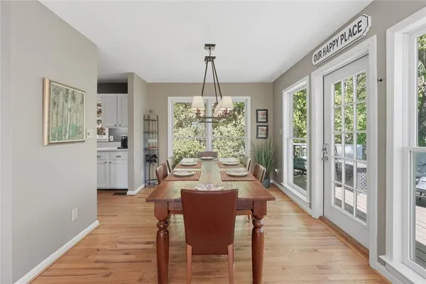 a dining room with furniture window wooden floor