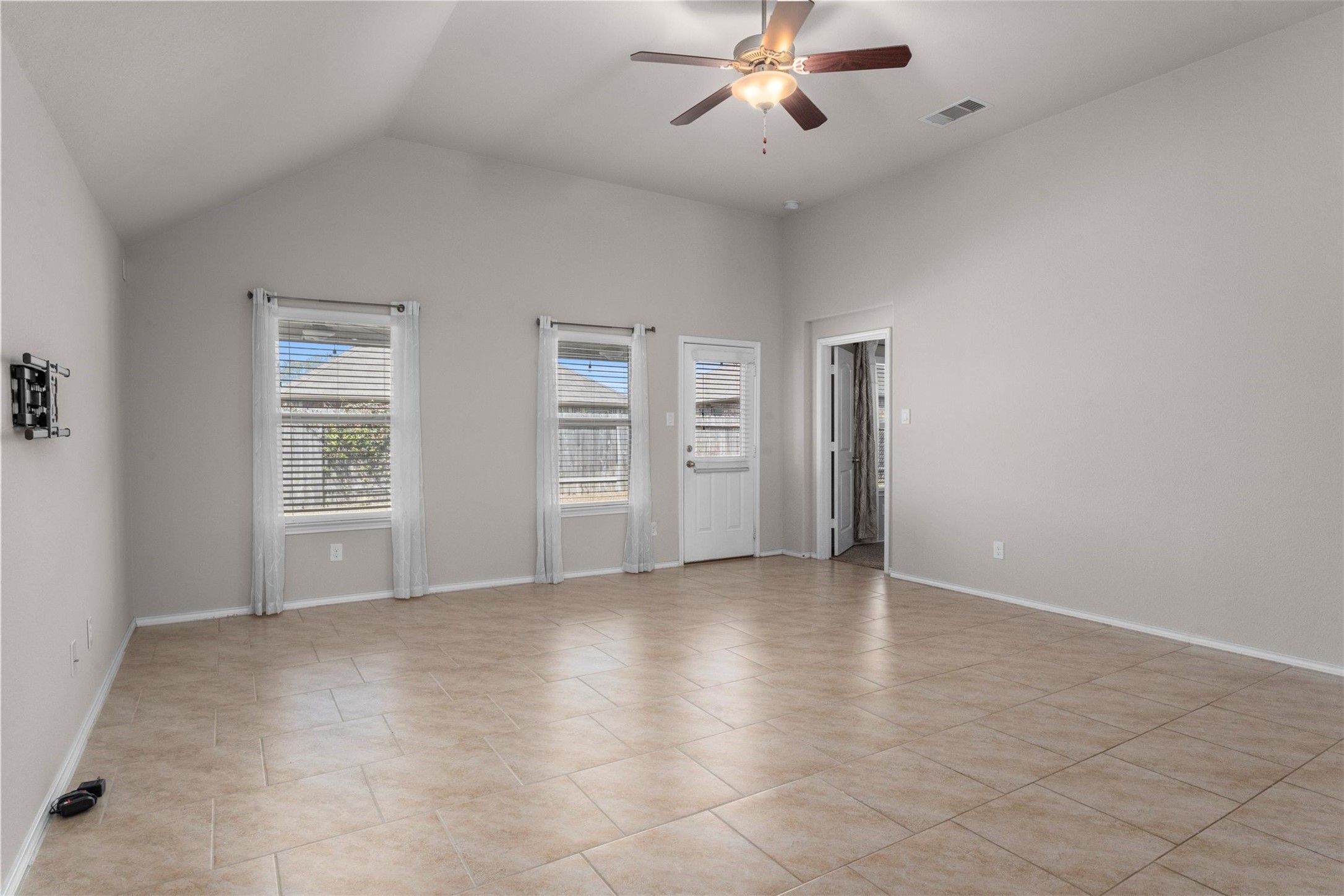 5210 Adria Hills Circle Spring, TX 77389 - Photo 11 of 42 Large living room with fan and blinds throughout the house