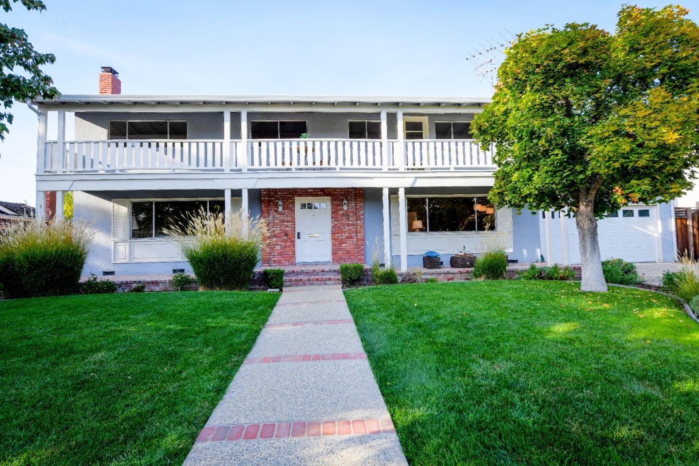 1130 Bruckner Circle Mountain View, CA 94040 - Photo 1 of 41 a front view of a house with a yard
