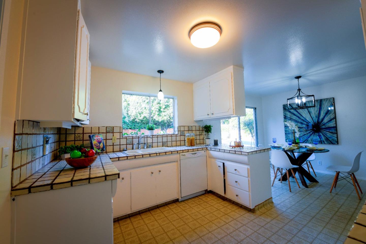 1130 Bruckner Circle Mountain View, CA 94040 - Photo 12 of 41 a kitchen with a sink and cabinets
