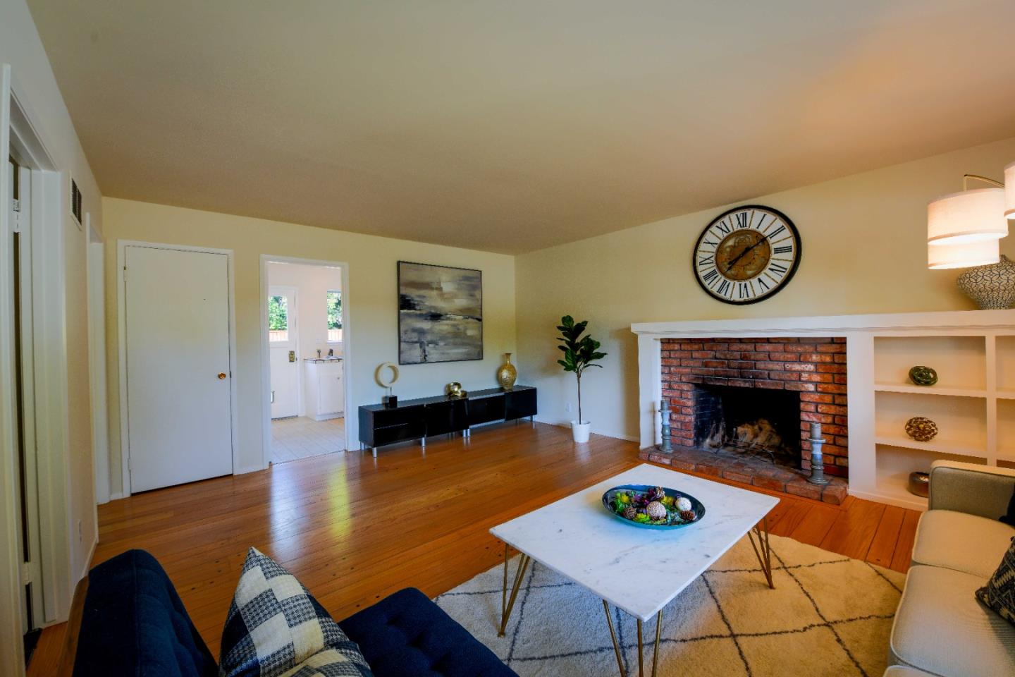 1130 Bruckner Circle Mountain View, CA 94040 - Photo 17 of 41 a living room with furniture and a fireplace