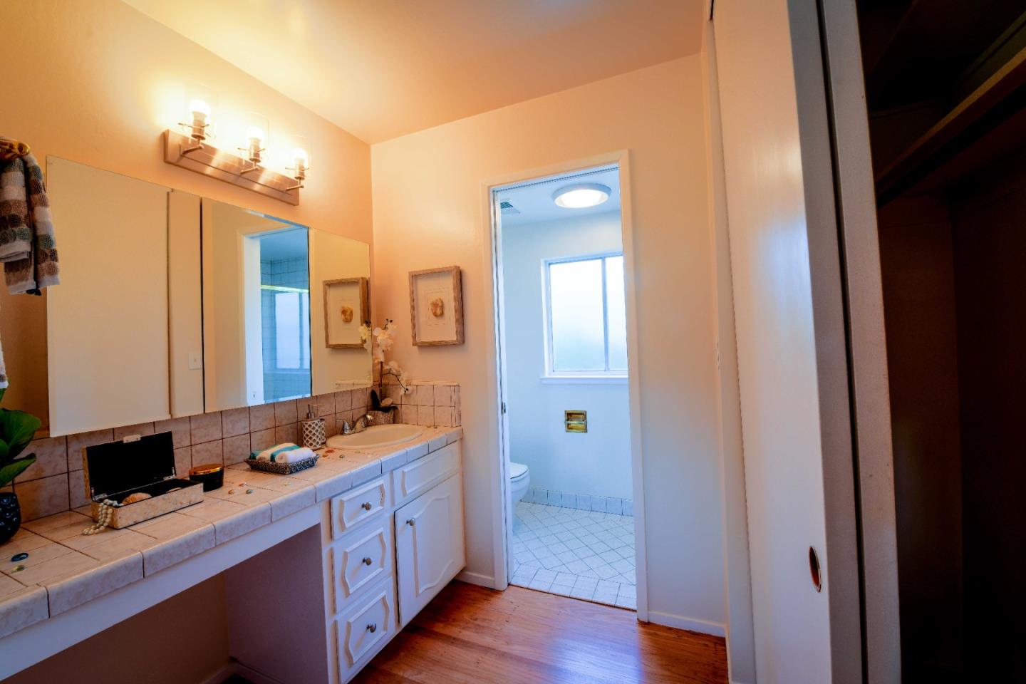 1130 Bruckner Circle Mountain View, CA 94040 - Photo 24 of 41 a spacious bathroom with a double vanity sink a large mirror and a shower