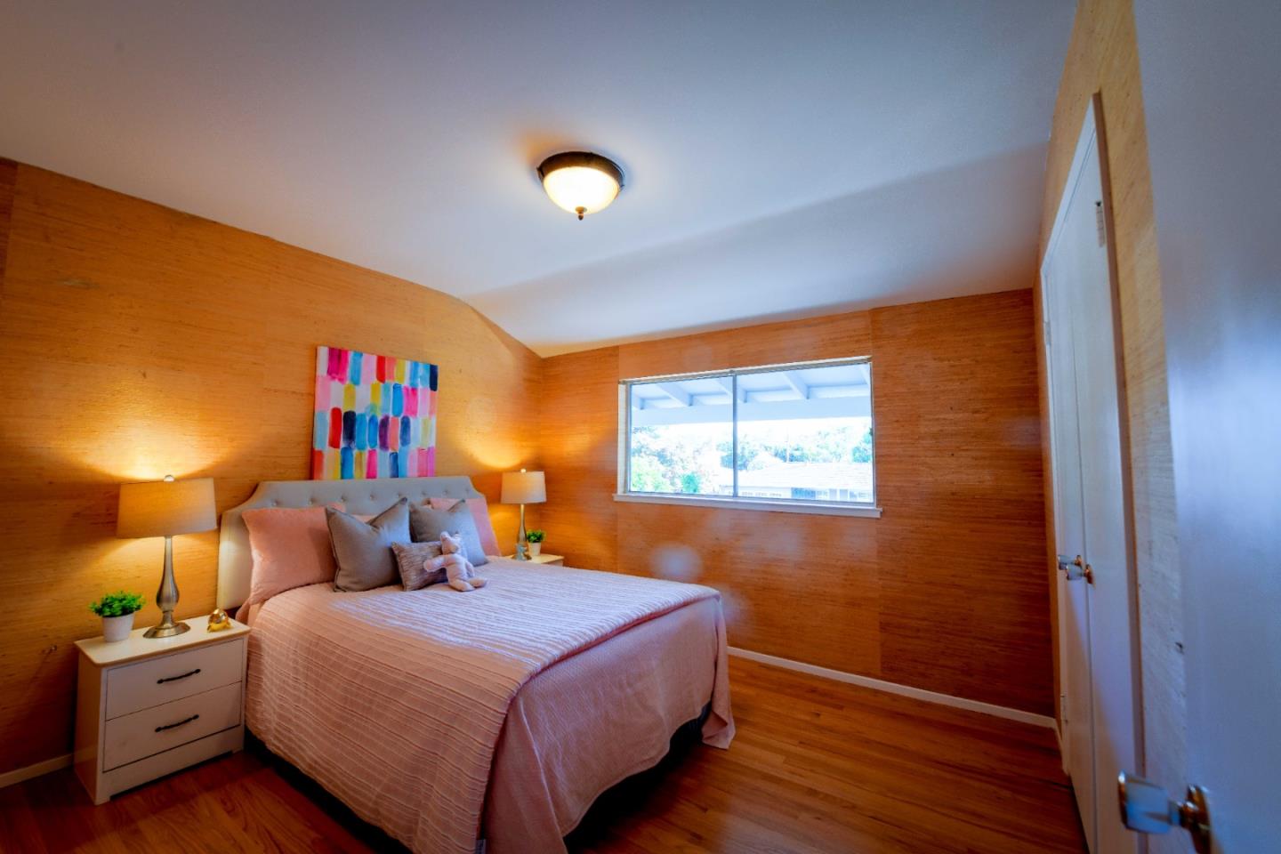 1130 Bruckner Circle Mountain View, CA 94040 - Photo 29 of 41 a bedroom with a bed and a potted plant