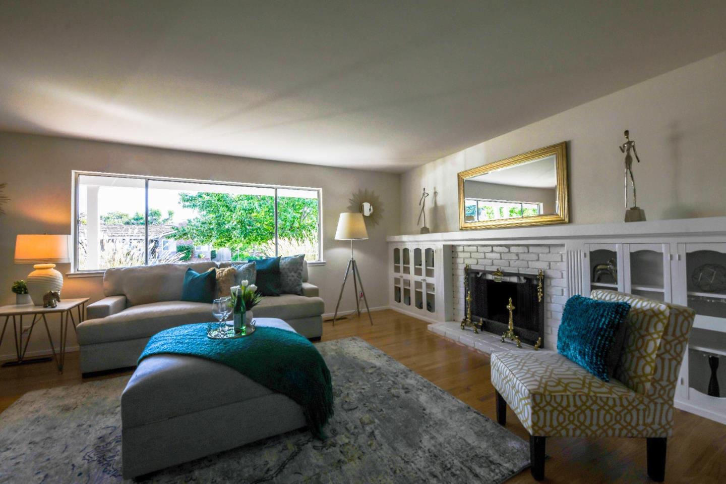 1130 Bruckner Circle Mountain View, CA 94040 - Photo 4 of 41 a living room with furniture and a fireplace