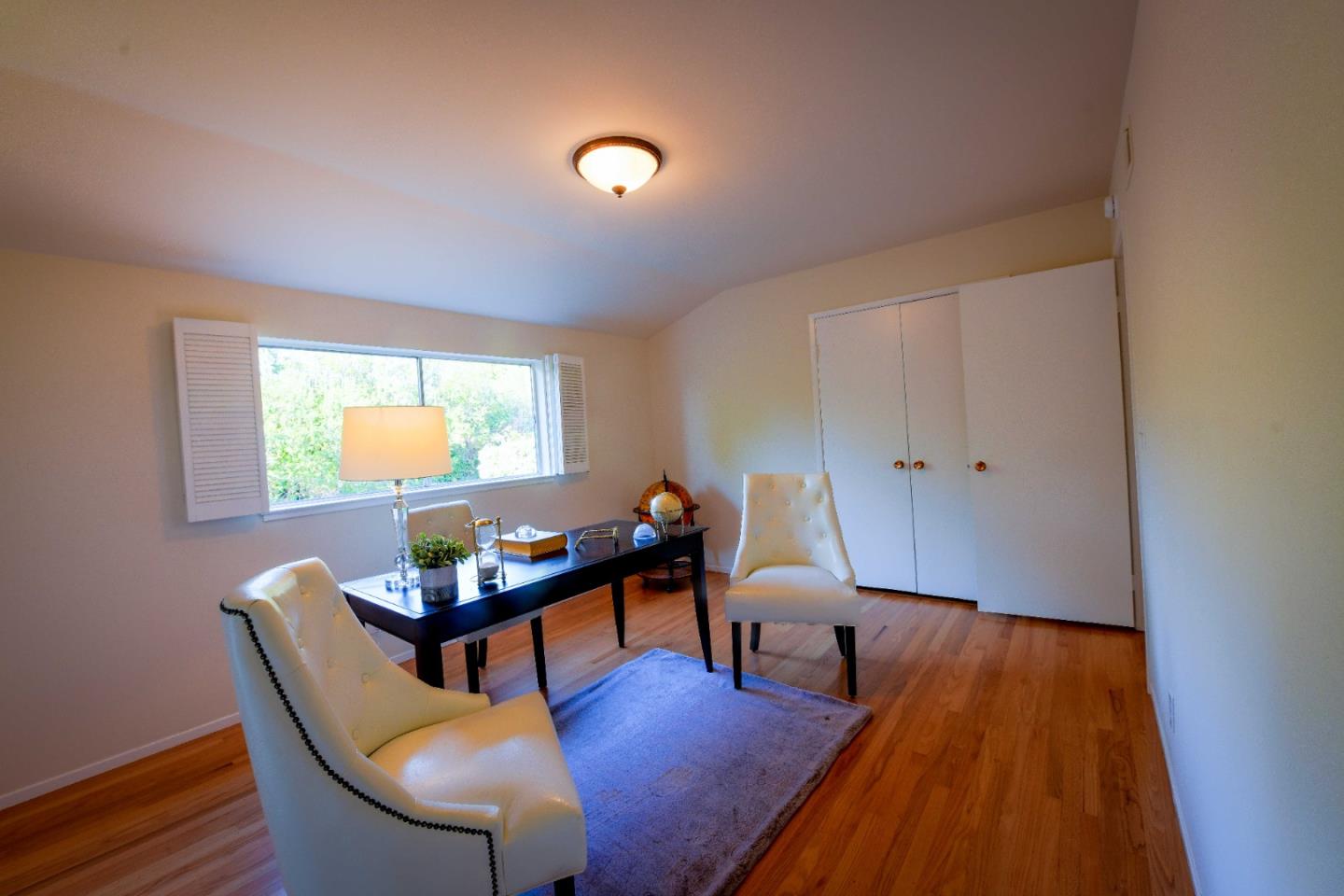 1130 Bruckner Circle Mountain View, CA 94040 - Photo 34 of 41 a living room with furniture and a wooden floor