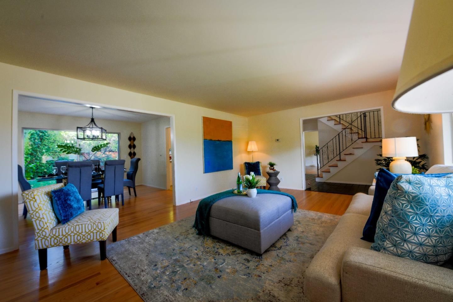 1130 Bruckner Circle Mountain View, CA 94040 - Photo 5 of 41 a living room with furniture and a chandelier