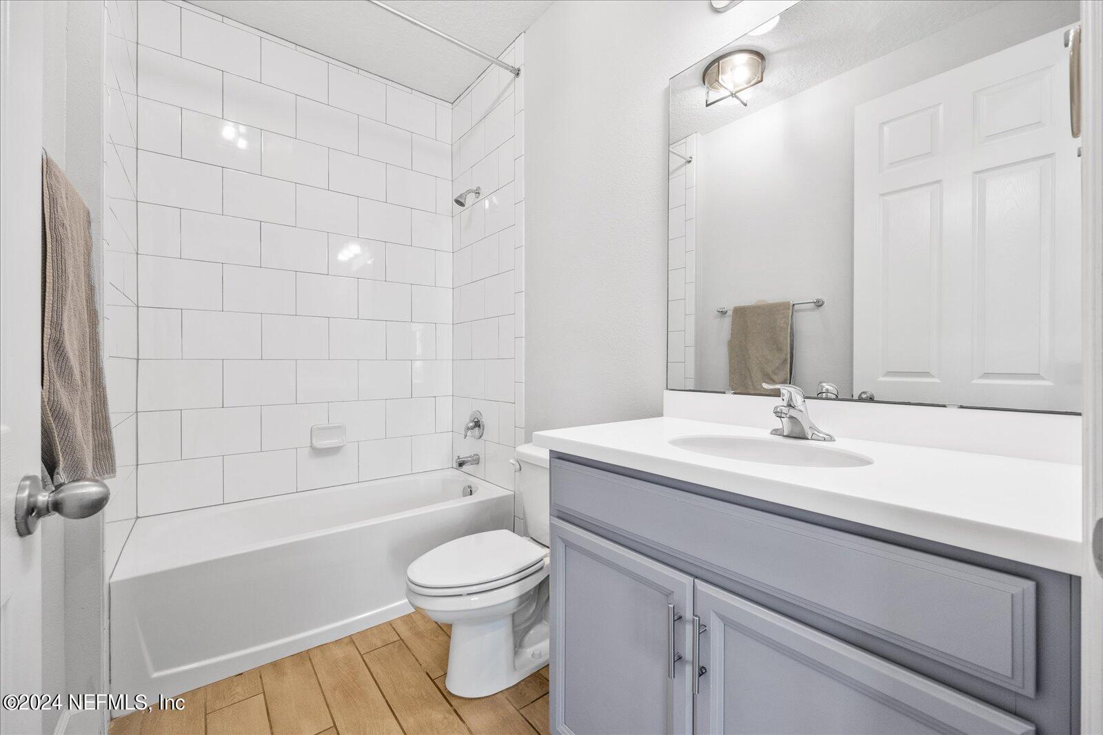36 Foster Lane Ponte Vedra, FL 32081 - Photo 13 of 59 a bathroom with a sink a toilet and shower